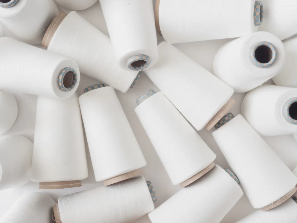 Yarn cones and textile production — Natural yarns