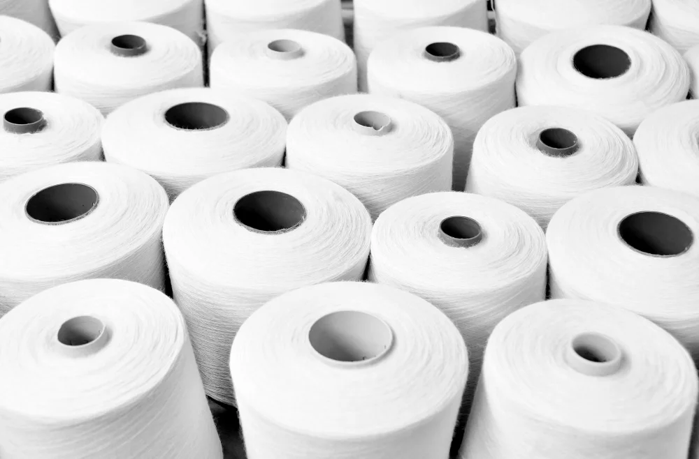 Yarn cones and textile production — Synthetic yarns